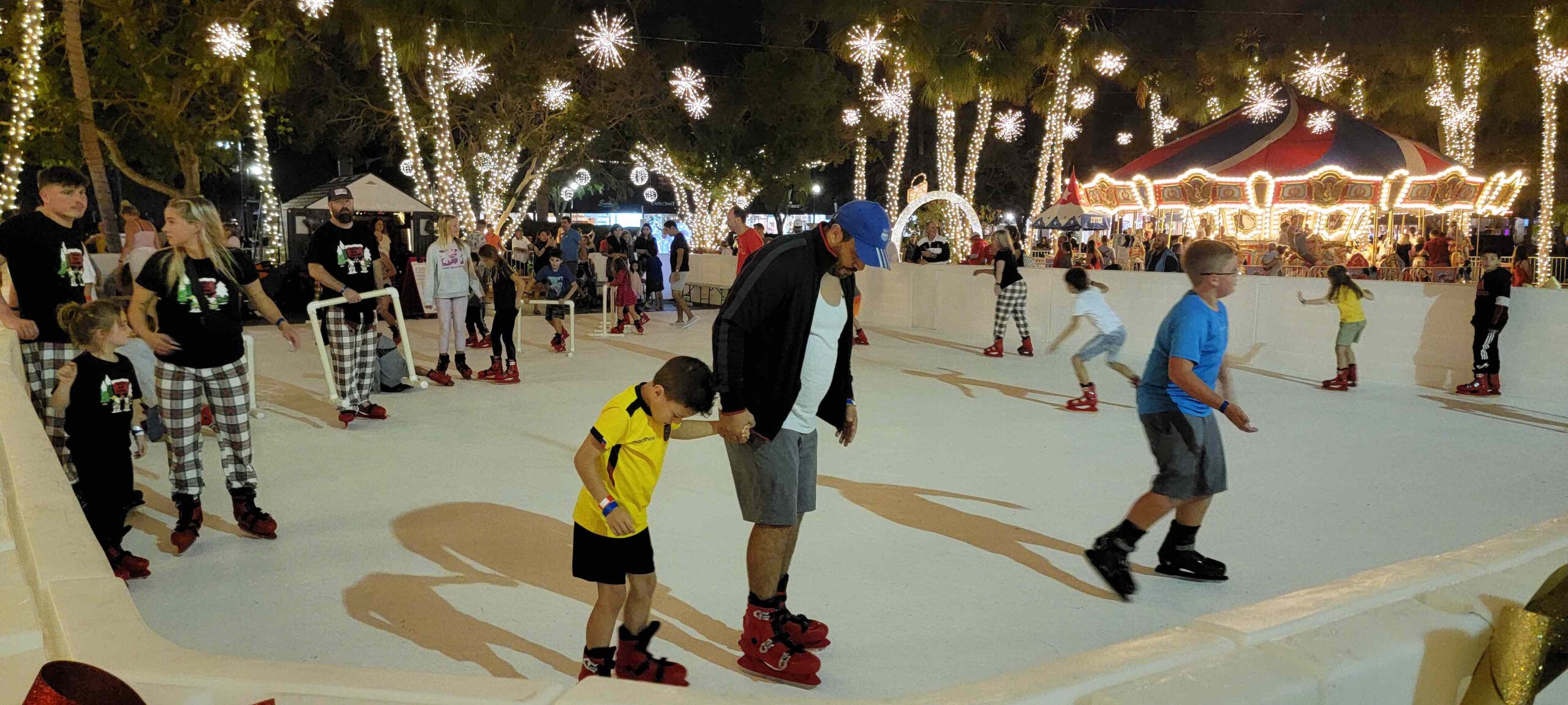 Global synthetic ice skating rink at Winter Spectacular on St. Armands Circle