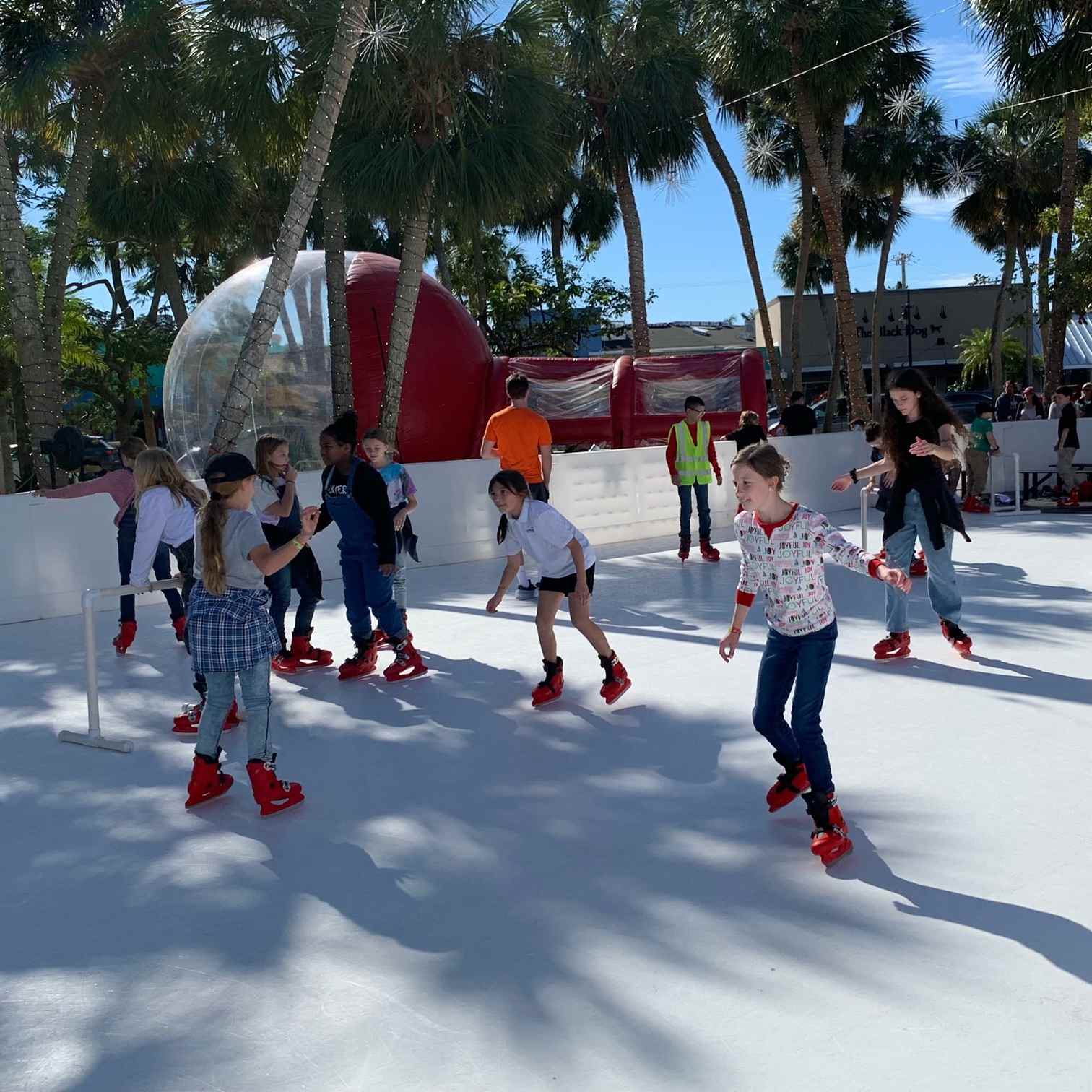 Super-Glide synthetic ice skating rink at Winter Spectacular on St. Armands Circle, rental ice skates